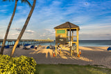 Lifeguard Stand and Long Pier into Deep Blue Skies