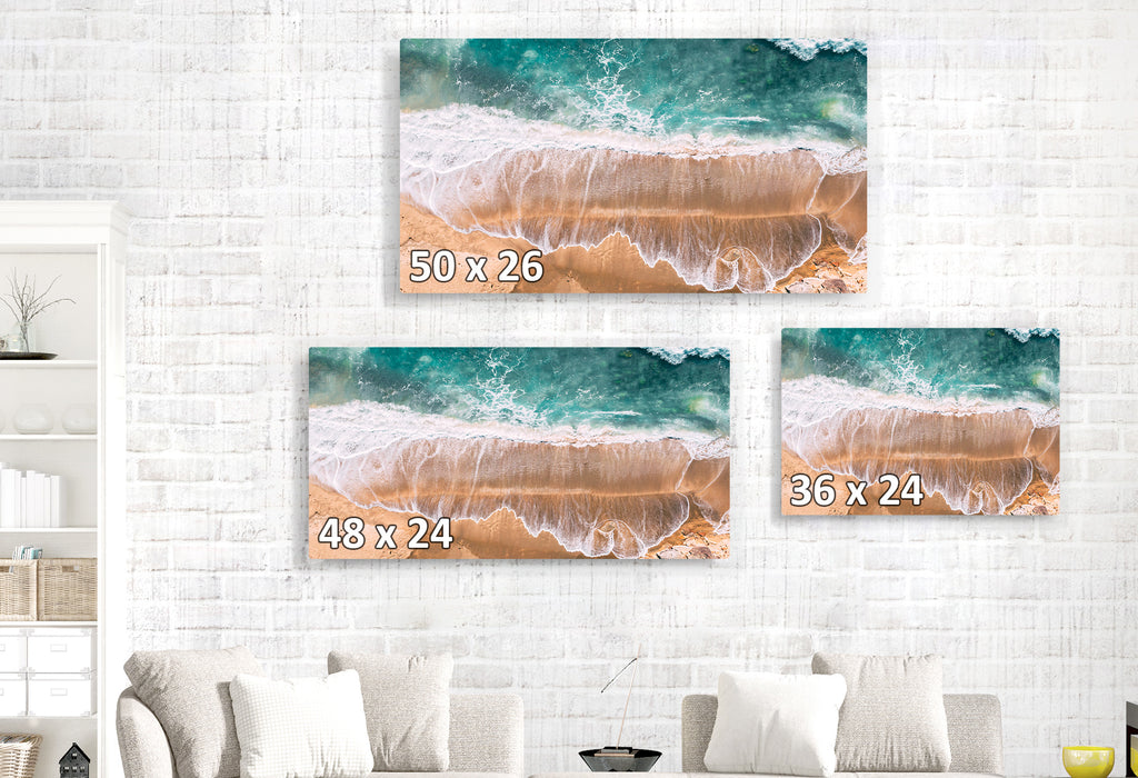 Isolated Long Beach from Above, White, Blue, Teal, Rocks